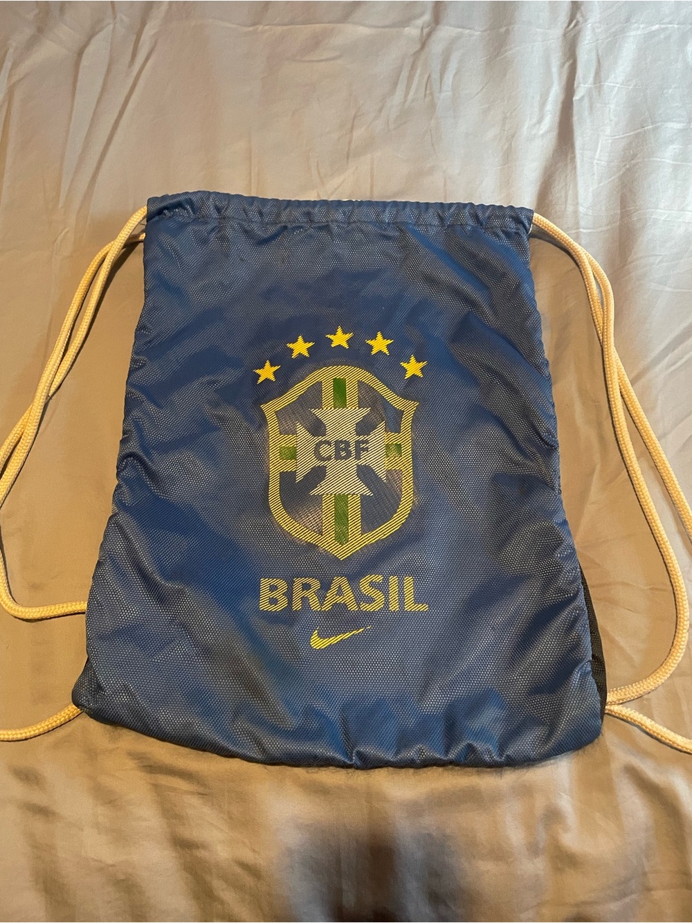 Nike Brasil Navy Blue Drawstring Backpack with Yellow Accents
